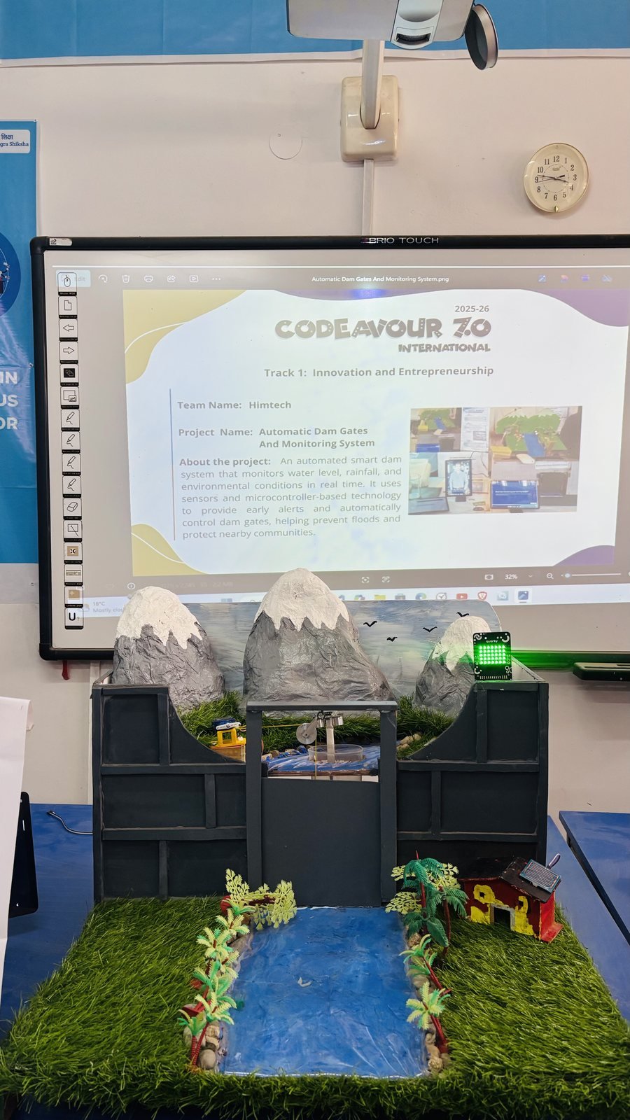 Codeavour 7.0 entry slide above JalRakshak prototype model, Team HimTech